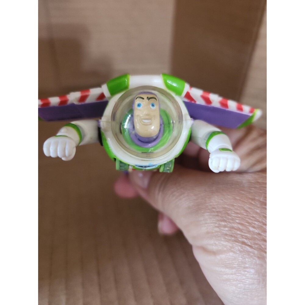 Disney Parks Toy Story Buzz Lightyear Flying Pullback Toy.